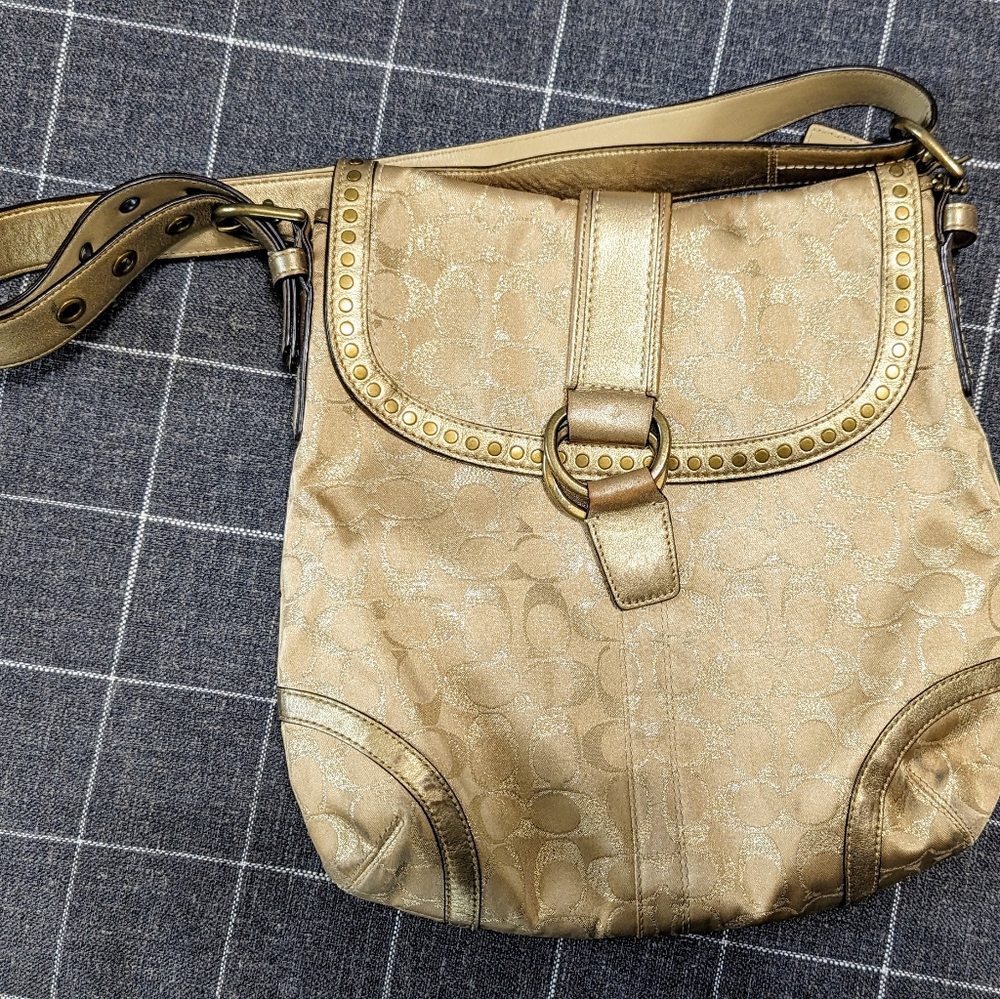 Gold coach purse